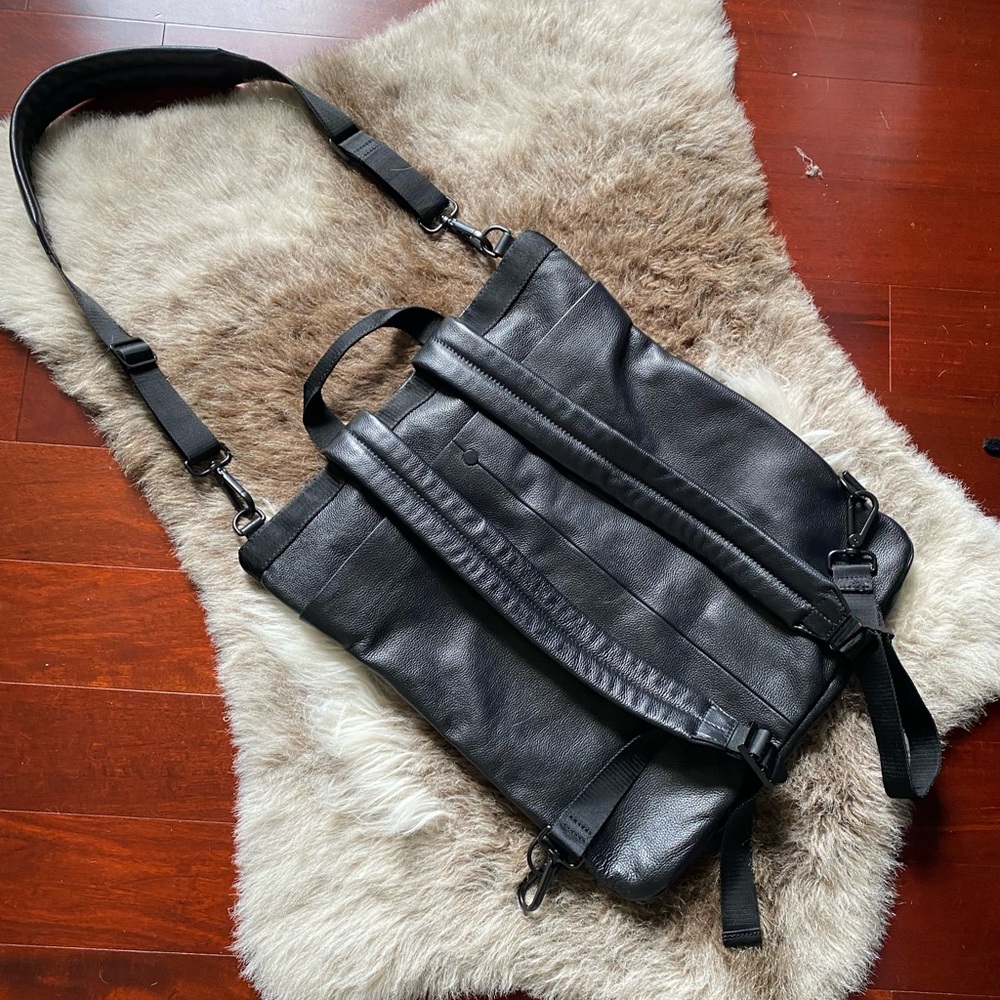 Black leather COS convertible backpack